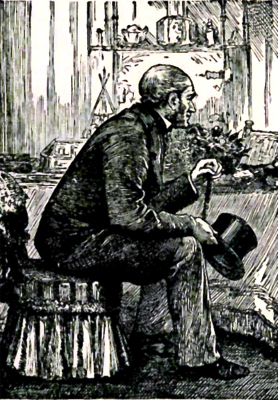 Man Sitting Down with a hat in his hand